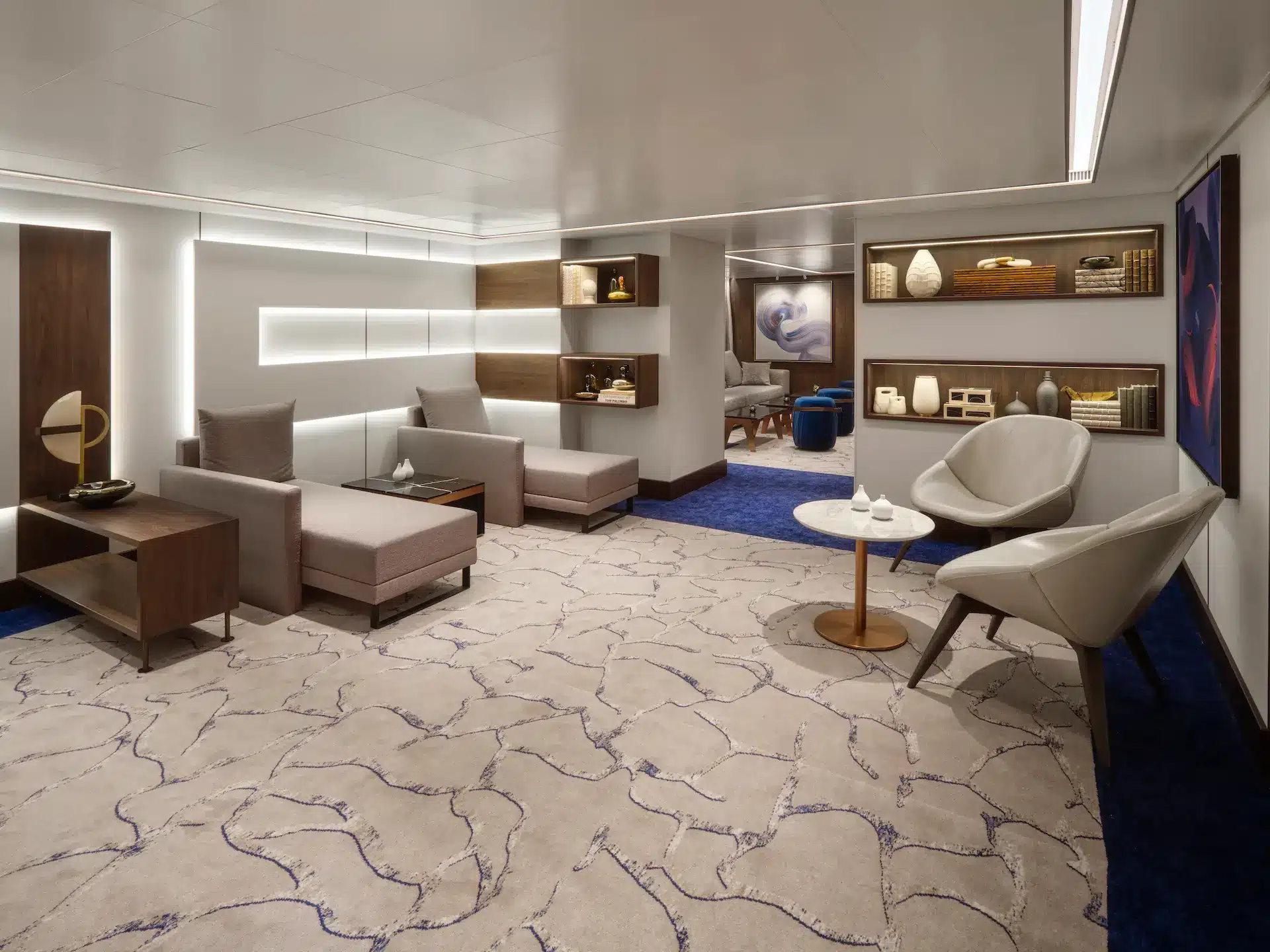 Luxe lounge van The Haven suites aan boord van Norwegian Escape.